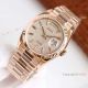 Swiss Replica Rolex Daydate 36 Rose Gold Diamond-Paved Dial with Baguette rainbow Markers (4)_th.jpg